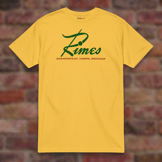 Rimes Daisy T-shirt flat lay on brick background