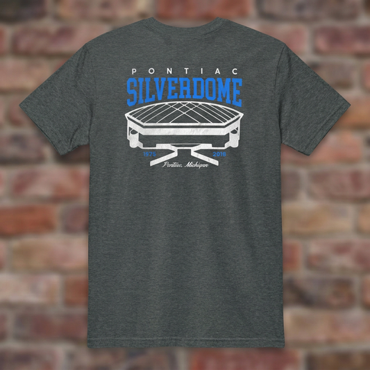 Pontiac Silverdome Dark Heather T-shirt flat lay on brick background