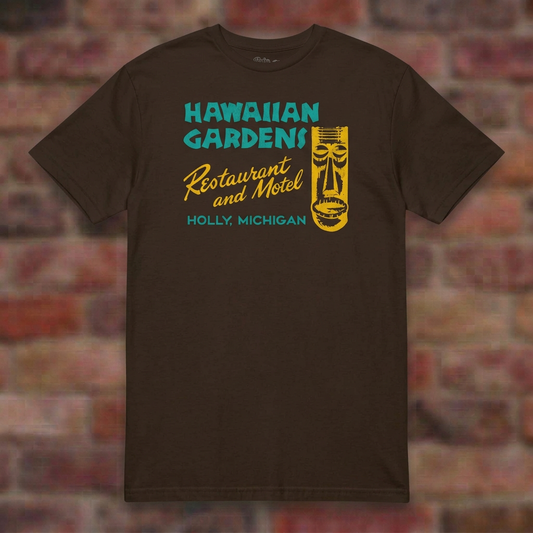 Hawaiian Gardens Dark Chocolate T-shirt flat lay on brick background