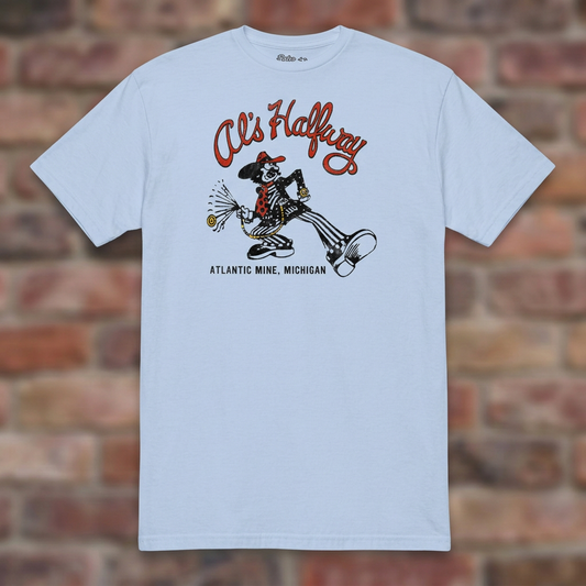 Al's Halfway Light Blue T-shirt flat lay on brick background