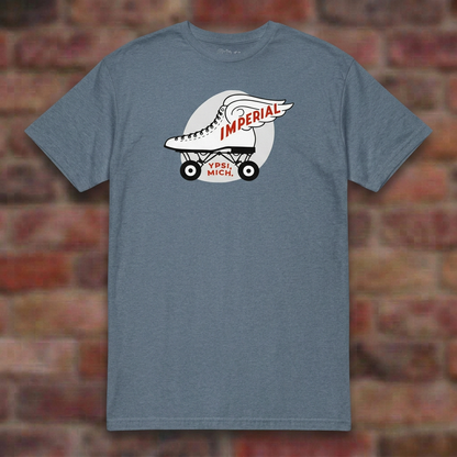 Imperial Roller Rink Heather Indigo T-shirt flat lay on brick background