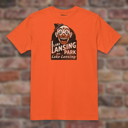 Lake Lansing Park Orange T-shirt flat lay on brick background