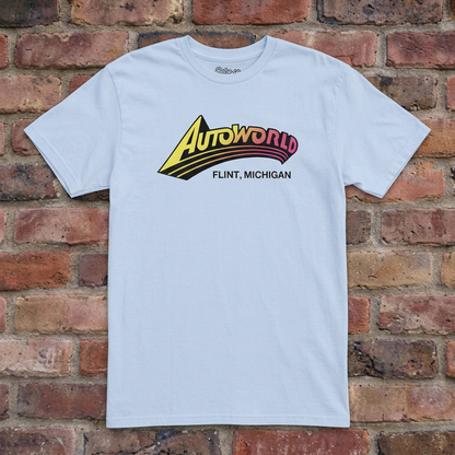 Autoworld Light Blue T-shirt flat lay on brick background