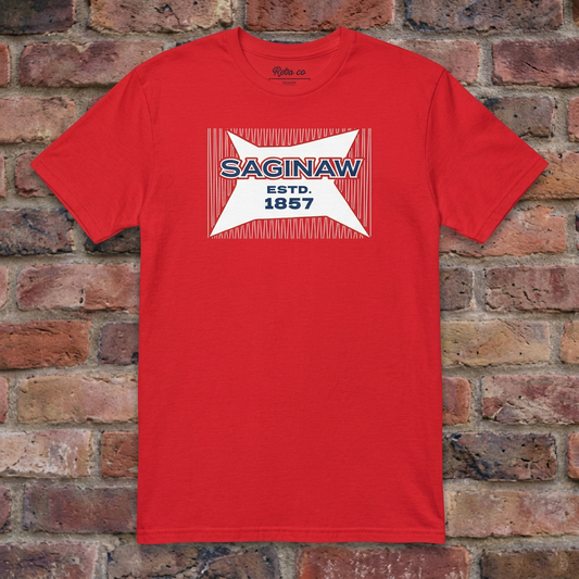 Saginaw Bread Bag Red T-shirt flat lay on brick background