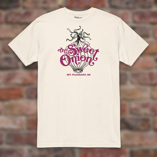 The Sweet Onion Natural T-shirt flat lay on brick background