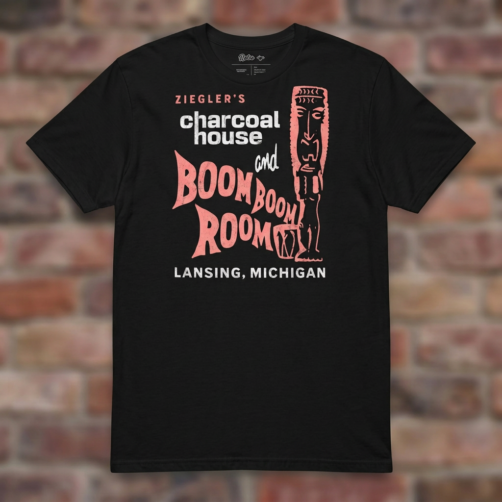 Ziegler's Black T-shirt flat lay on brick background