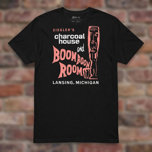 Ziegler's Black T-shirt flat lay on brick background