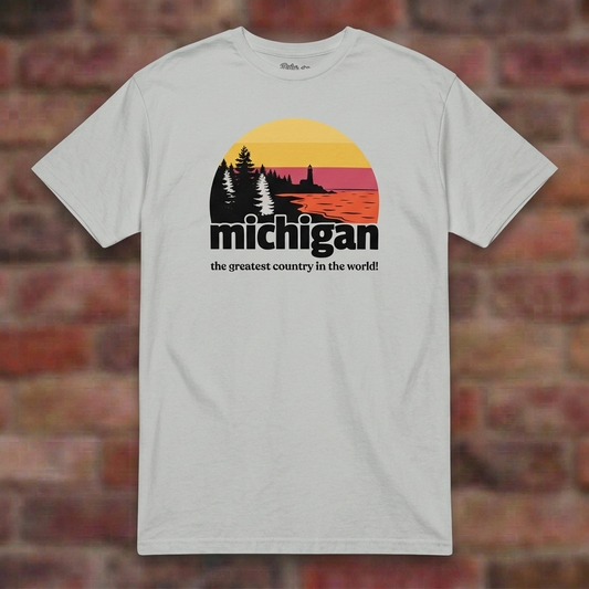 Michigan Greatest Country Ice Grey T-shirt flat lay on brick background
