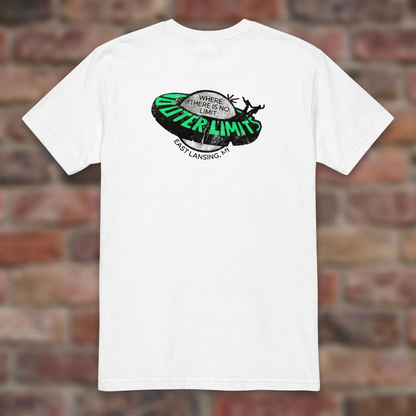 Outer Limits White T-shirt flat lay on brick background