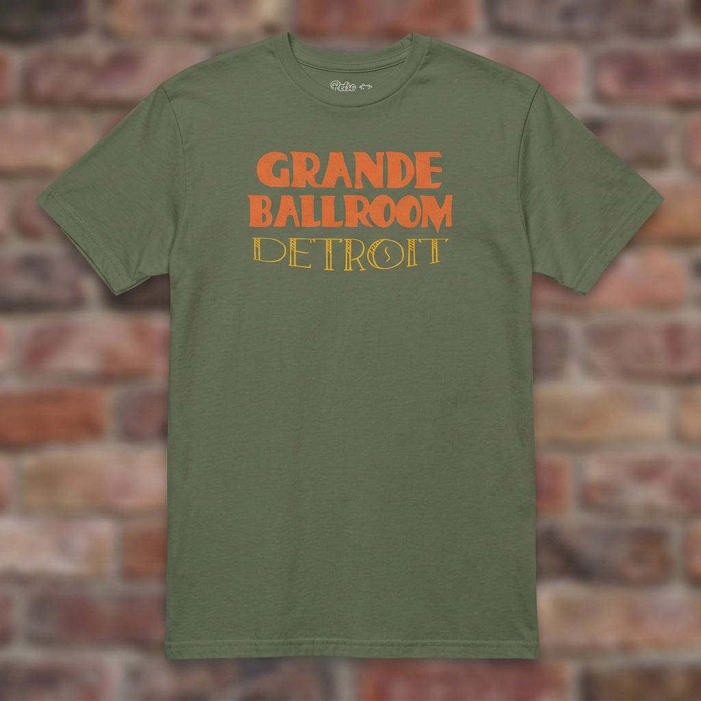 Grande Ballroom Detroit Military Green T-shirt flat lay on brick background