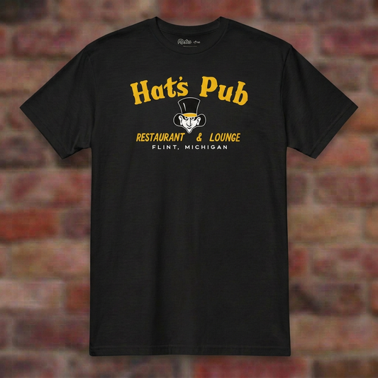 Hat's Pub Flint Black T-shirt flat lay on brick background
