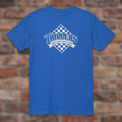 Trippers Lansing Royal T-shirt flat lay on brick background