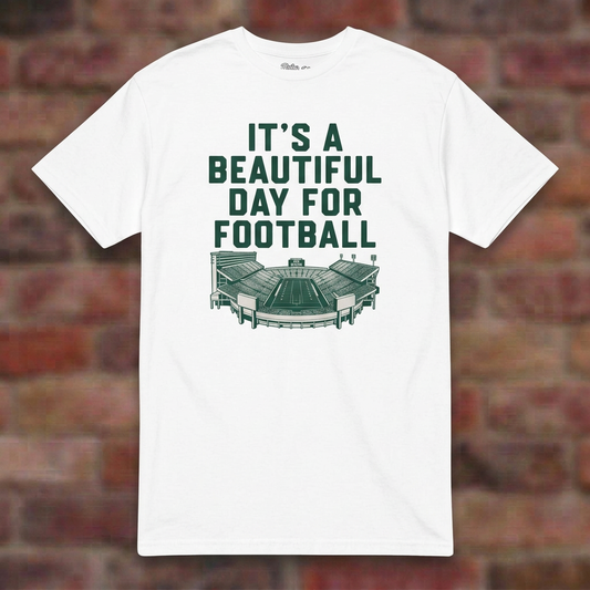 It's a Beautiful Day for Football White T-shirt flat lay on brick background