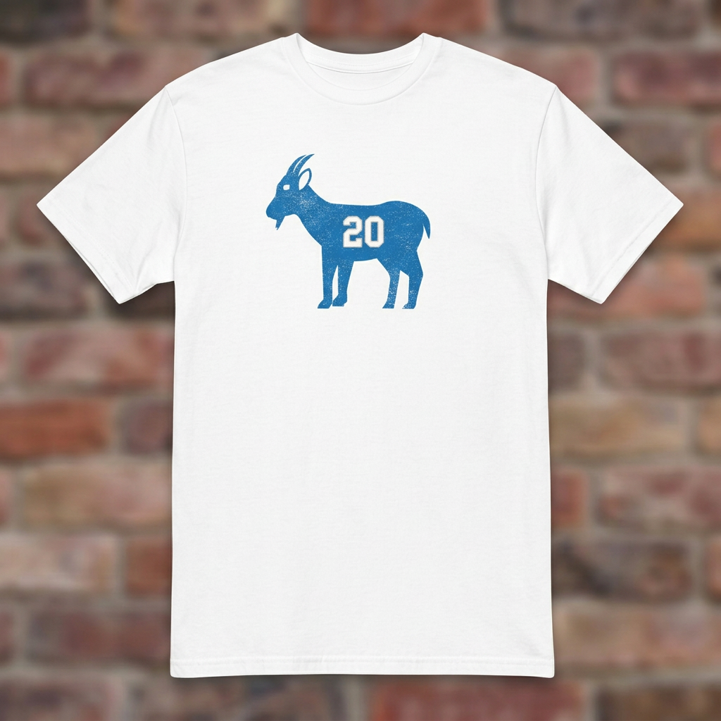 GOAT Barry White T-shirt flat lay on brick background