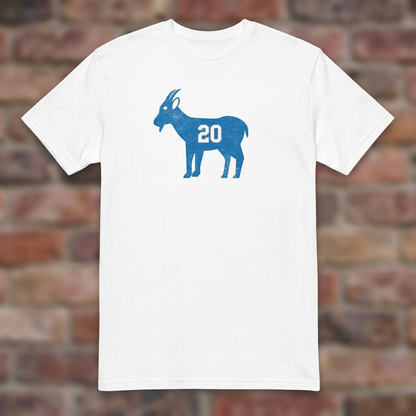 GOAT Barry White T-shirt flat lay on brick background