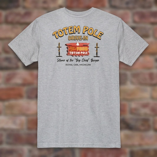 Totem Pole Drive-In Sport Grey T-shirt flat lay on brick background