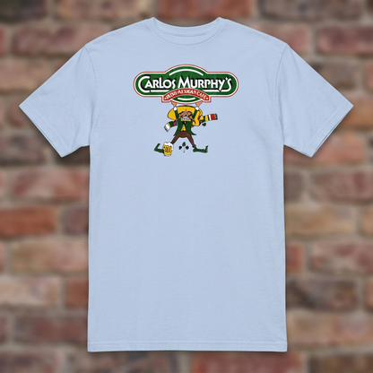 Carlos Murphy's Light Blue T-shirt flat lay on brick background