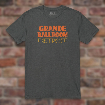 Grande Ballroom Detroit Dark Heather Grey T-shirt flat lay on brick background