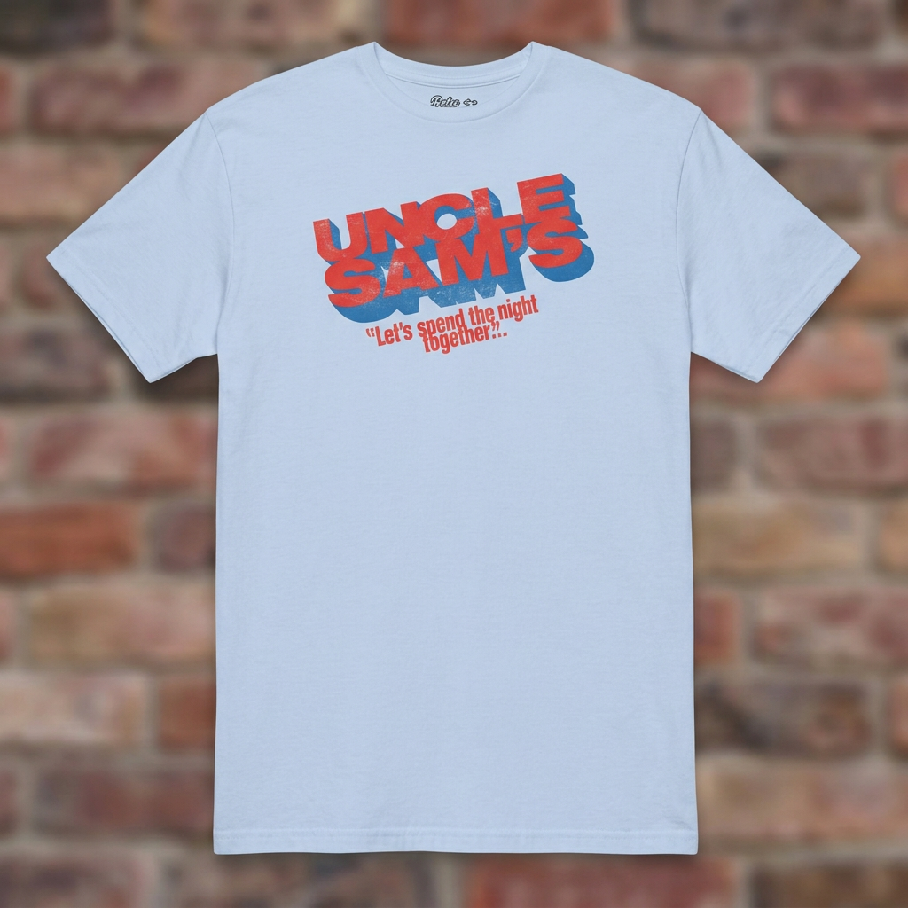 Uncle Sam's Light Blue T-shirt flat lay on brick background