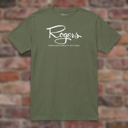 Roger's Department Store T-shirt in Military Green, flat lay on warm brick background