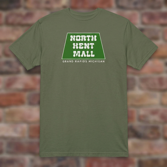 North Kent Mall Military Green T-shirt flat lay on brick background
