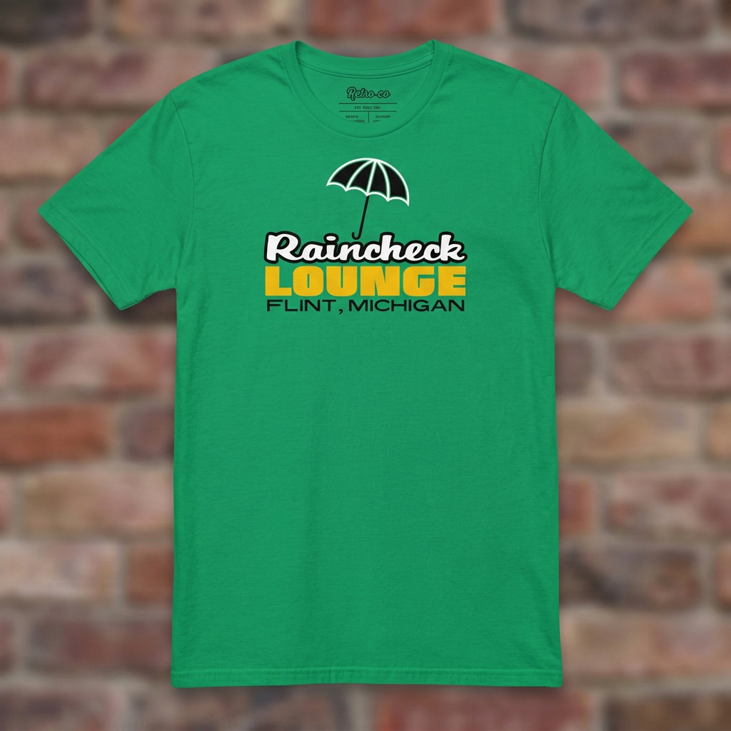 Raincheck Lounge Irish Green T-shirt flat lay on brick background