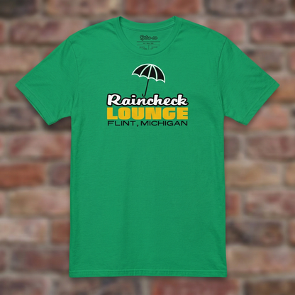 Raincheck Lounge Irish Green T-shirt flat lay on brick background