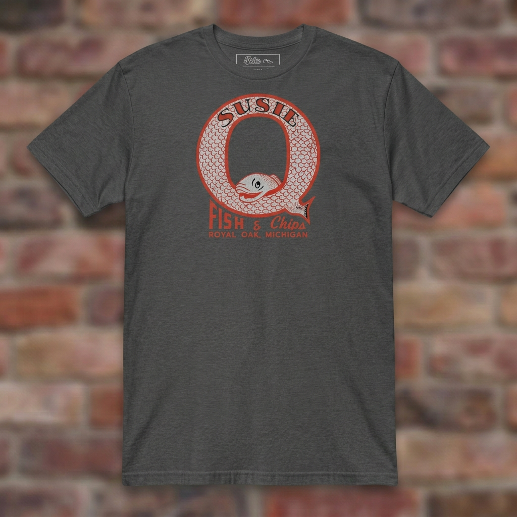 Susie Q Fish-n-Chips Dark Heather Grey T-shirt flat lay on brick background