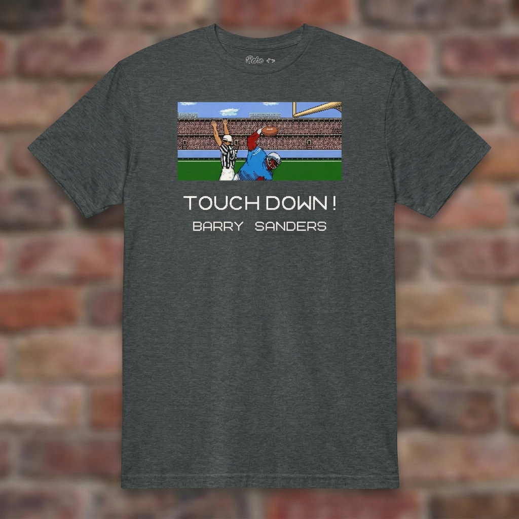 Touchdown Barry 8-Bit Dark Heather T-shirt flat lay on brick background
