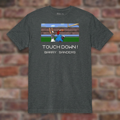 Touchdown Barry 8-Bit Dark Heather T-shirt flat lay on brick background