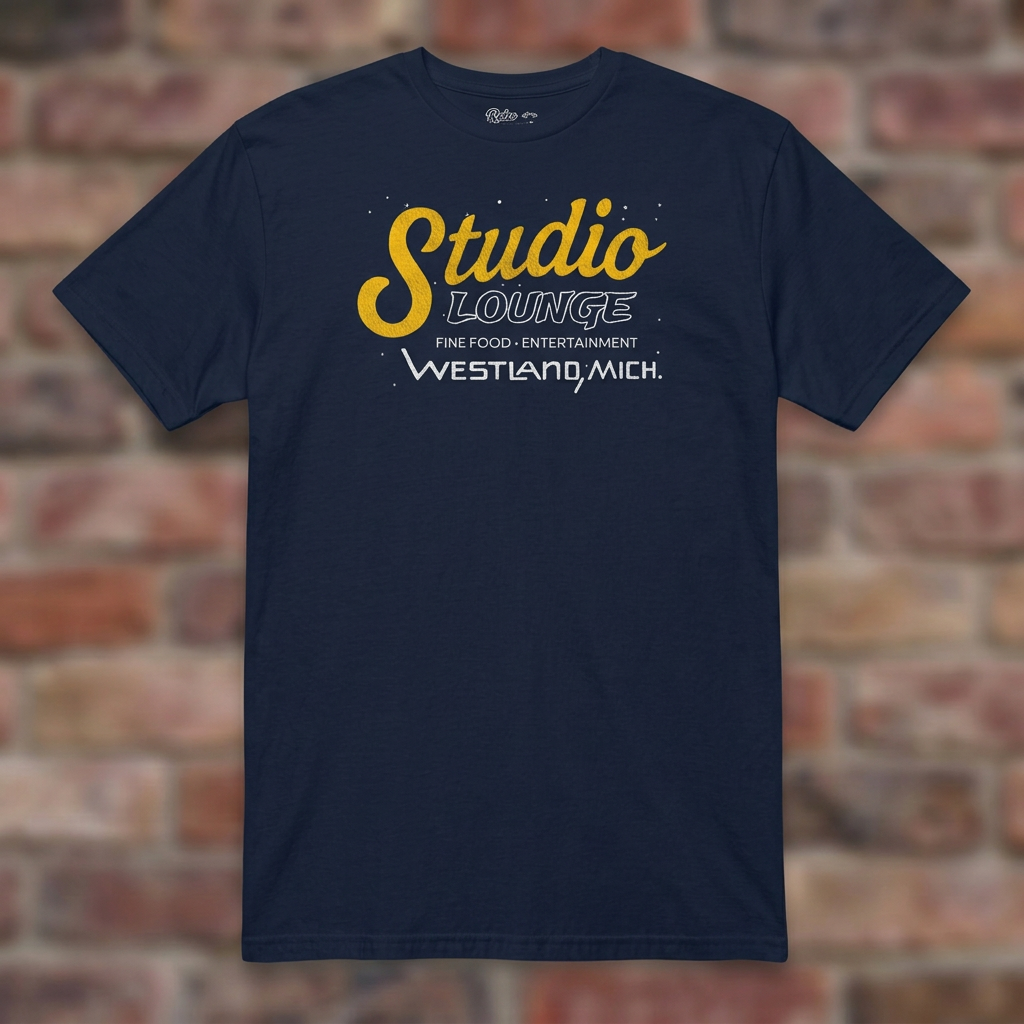 Studio Lounge Navy T-shirt flat lay on brick background