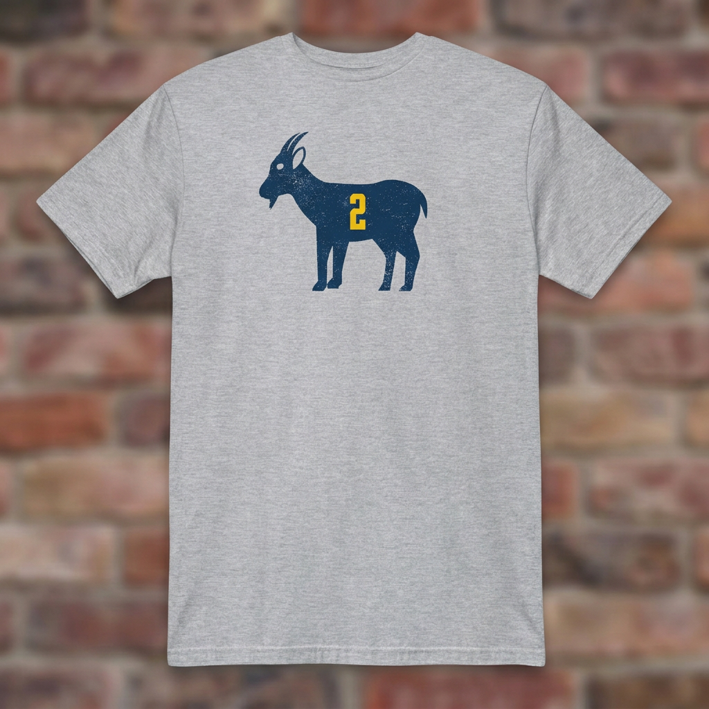 Sport Grey GOAT Woodson T-shirt flat-lay against weathered brick