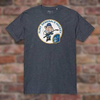 Flint Generals Hockey T-shirt in Heather Navy, flat lay on warm brick background