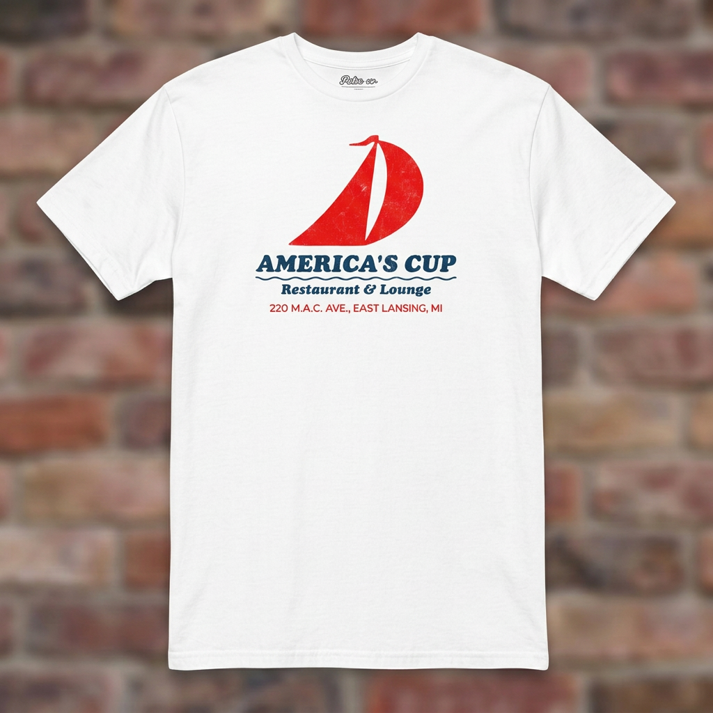 America's Cup White T-shirt flat lay on brick background