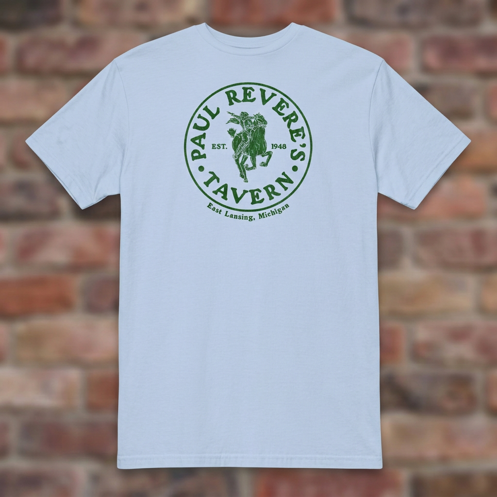 Paul Revere's Tavern Light Blue T-shirt flat lay on warm brick