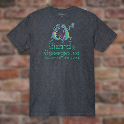 Lizard's Underground East Lansing Heather Navy T-shirt flat lay on brick background