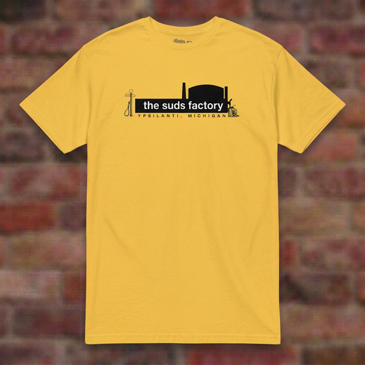 The Suds Factory Daisy T-shirt flat lay on brick background