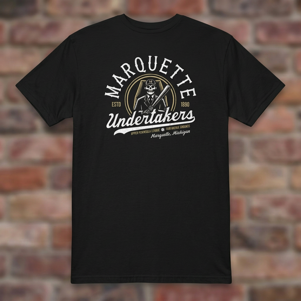 Marquette Undertakers Black T-shirt flat lay on brick background