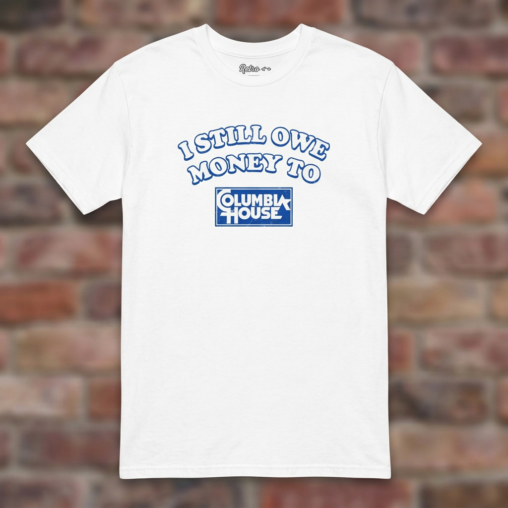 I Still Owe Money To Columbia House White T-shirt flat lay on brick background