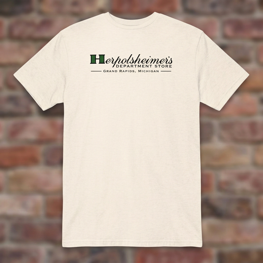 Herpolsheimer's Natural T-shirt flat lay on brick background