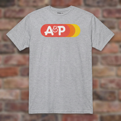 A&P Sport Grey T-shirt flat lay on brick background
