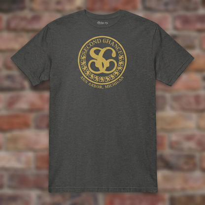 Second Chance Dark Heather Grey T-shirt flat lay on brick background