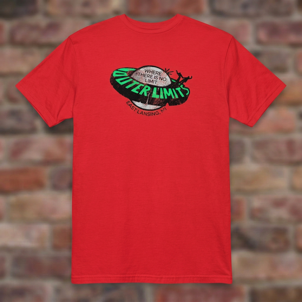 Outer Limits Red T-shirt flat lay on brick background