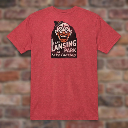 Lake Lansing Park Heather Red T-shirt flat lay on brick background