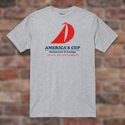 America's Cup Sport Grey T-shirt flat lay on brick background