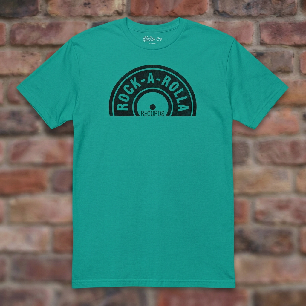 Rock-A-Rolla Records Jade Dome T-shirt flat lay on brick background