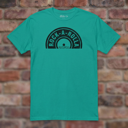 Rock-A-Rolla Records Jade Dome T-shirt flat lay on brick background