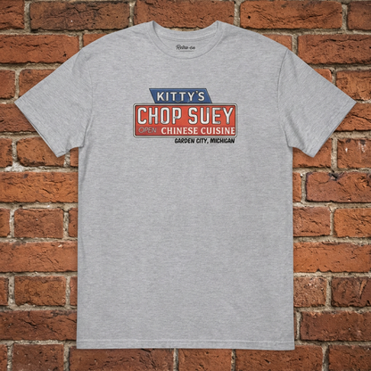 Kitty's Chop Suey Sport Grey T-shirt flat lay on brick background