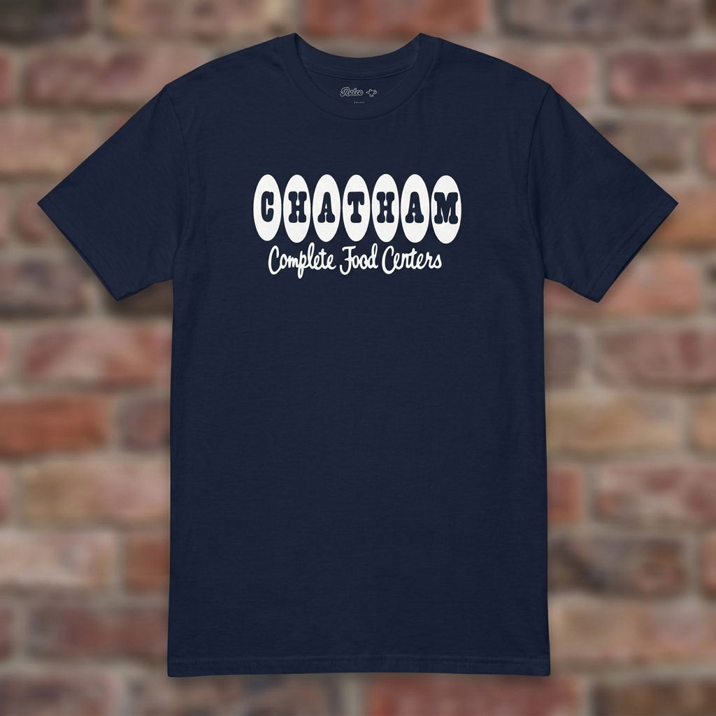 Chatham Navy T-shirt flat lay on brick background