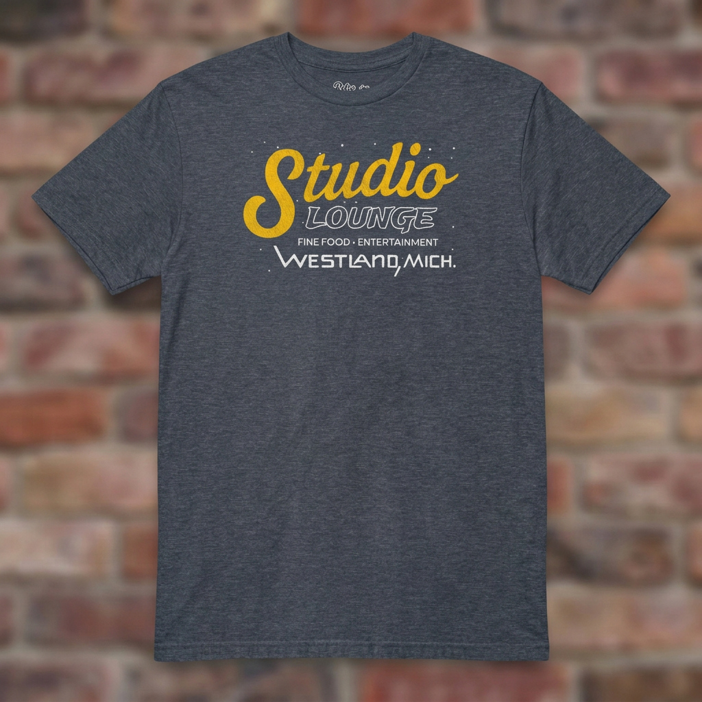 Studio Lounge Heather Navy T-shirt flat lay on brick background
